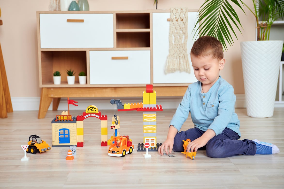 A Boy Playing Toys